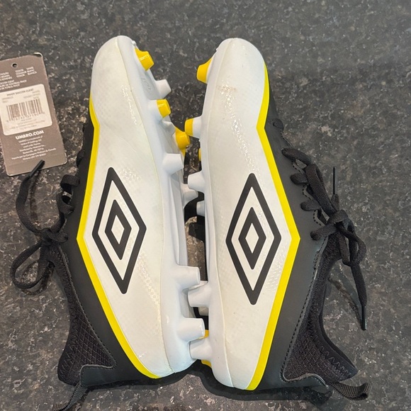 Umbro Black, Yellow, and White Soccer Cleats - Picture 3 of 8